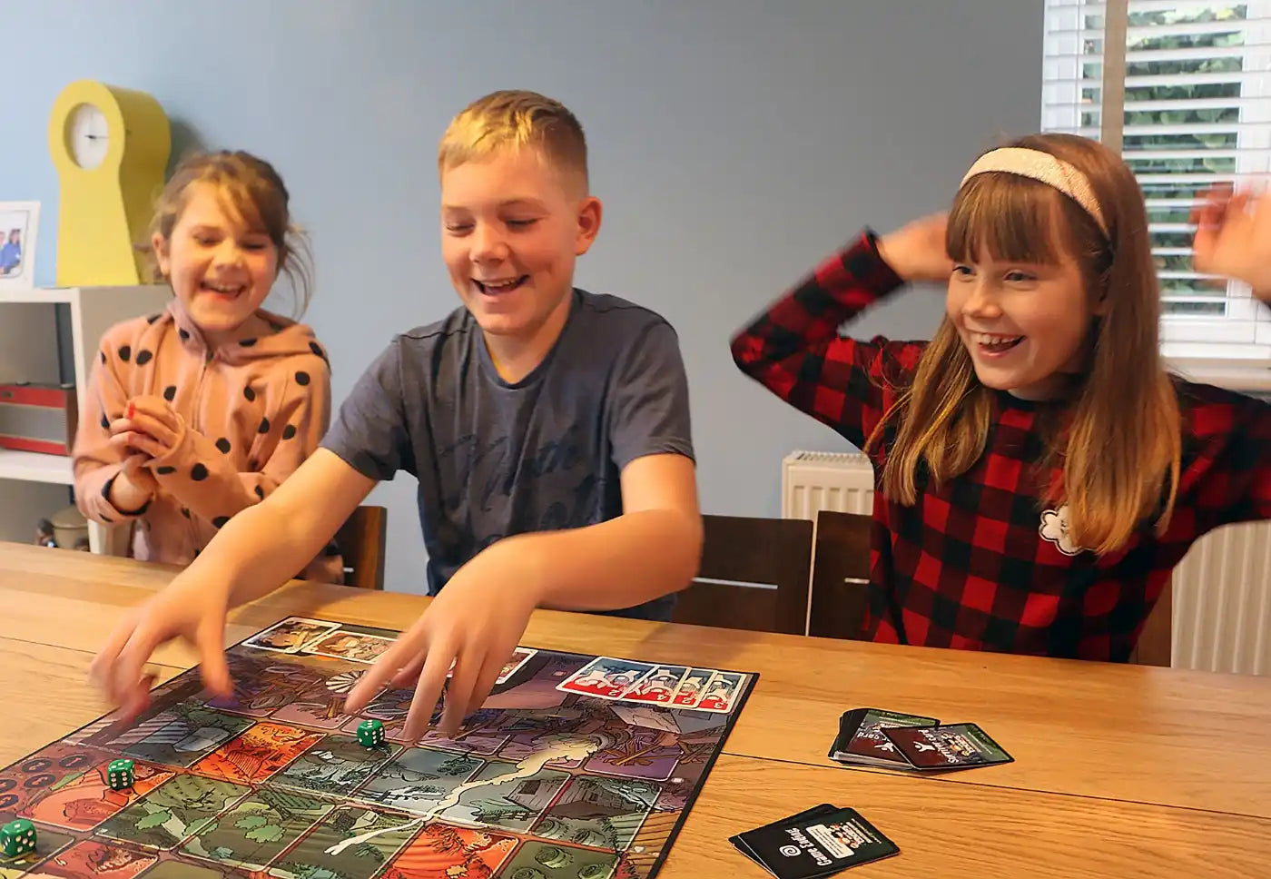 Children playing a board game.